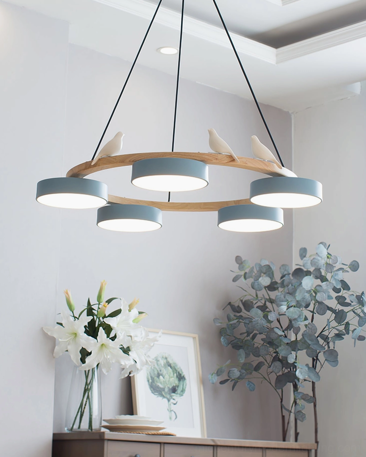 Sienna bird round pendant light in natural wood finish with five white lamp heads arranged in organic circular pattern