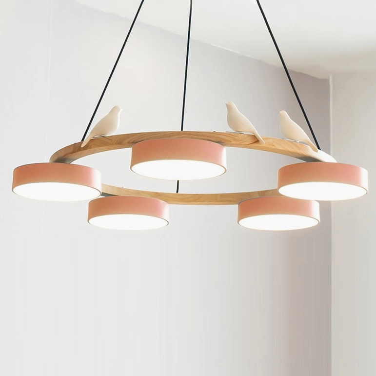Sienna bird round pendant light orange-pink coral finish showing warm peachy tone wood frame with frosted acrylic shades
