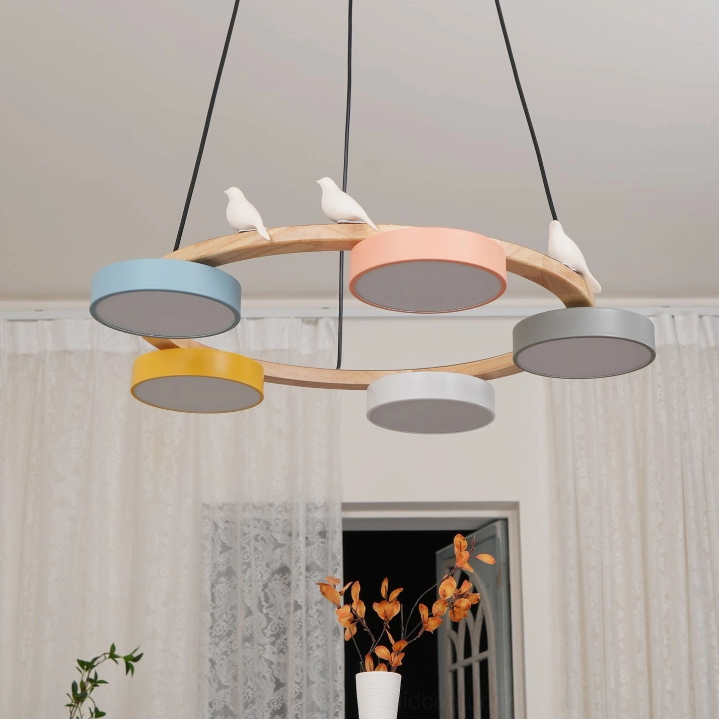 Sienna bird round pendant chandelier yellow finish variant with warm golden tone wood frame and frosted lamp shades