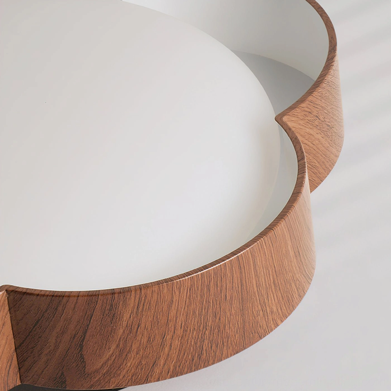 Sika ceiling light installed in transitional bedroom space with warm wood tones and minimalist aesthetic