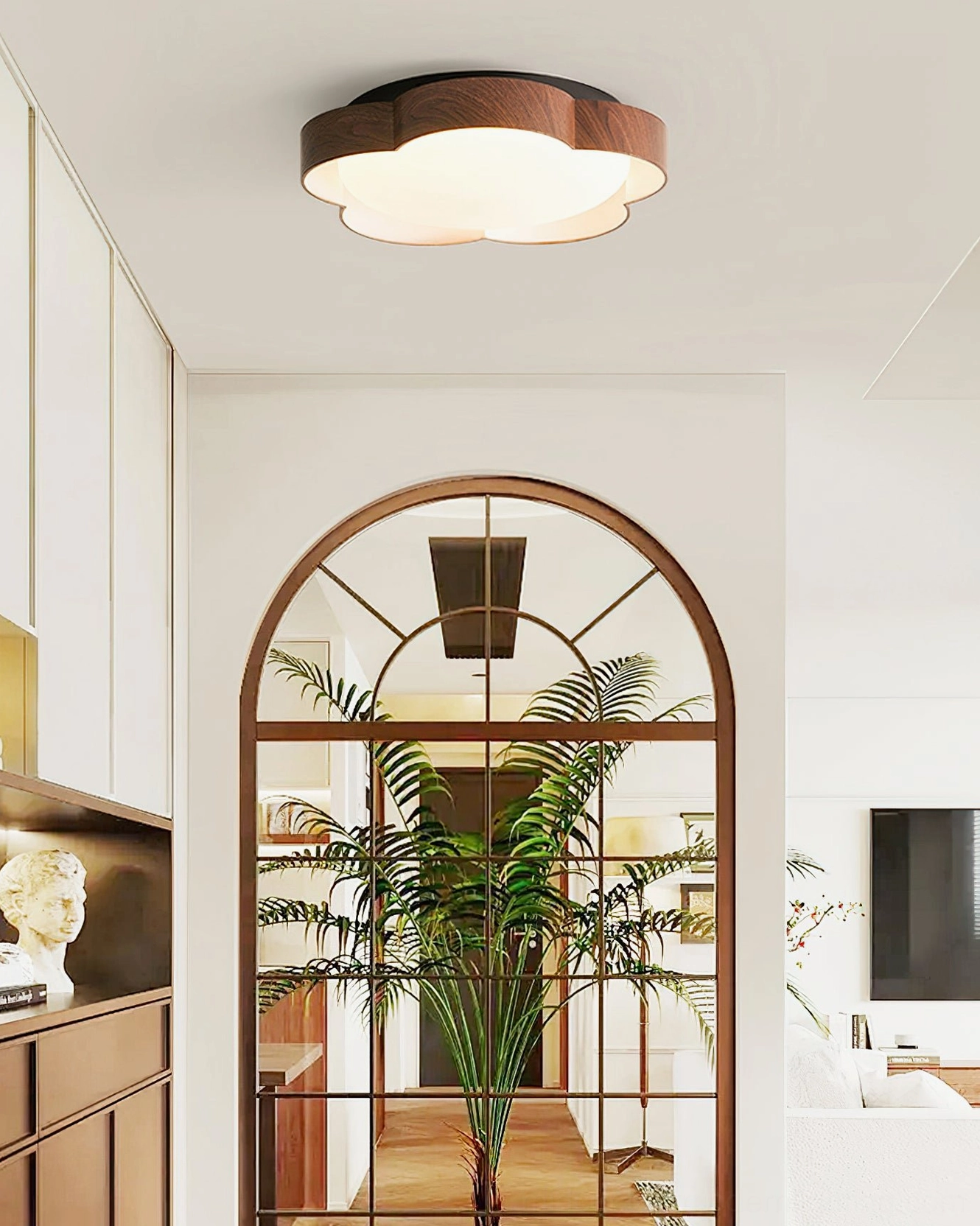 Sika flush mount fixture in vintage arched entryway with warm wood trim and retro home style decor