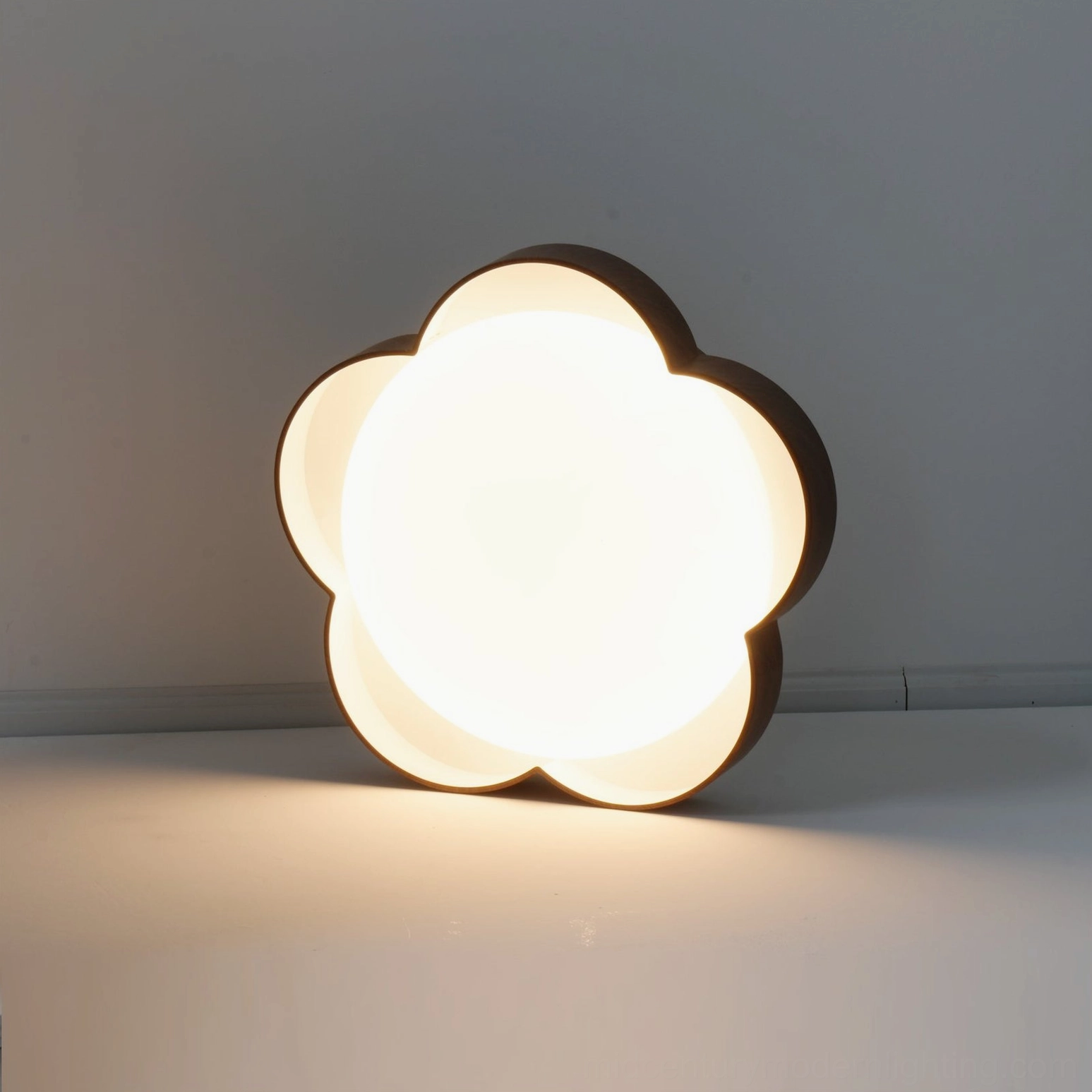 Sika organic petal ceiling lamp showing metal frame construction with wood-grain or matte powder coat finish