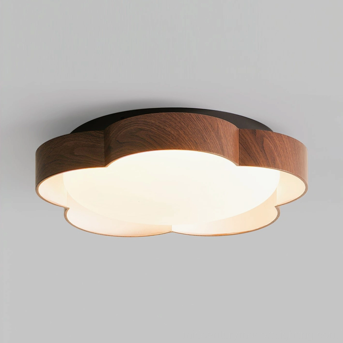 Sika ceiling fixture in walnut and black finish installed over dining area with ambient lighting design