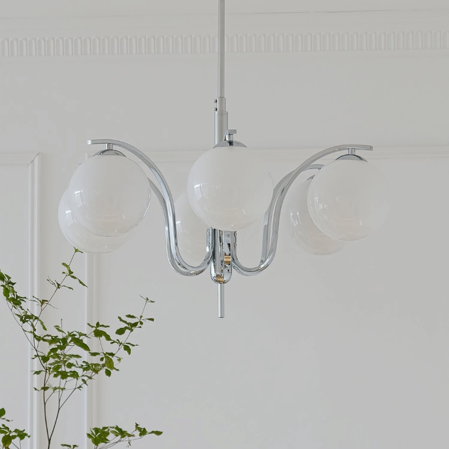 6-head clear glass globe chandelier with curved chrome arms and transparent white globes, side view