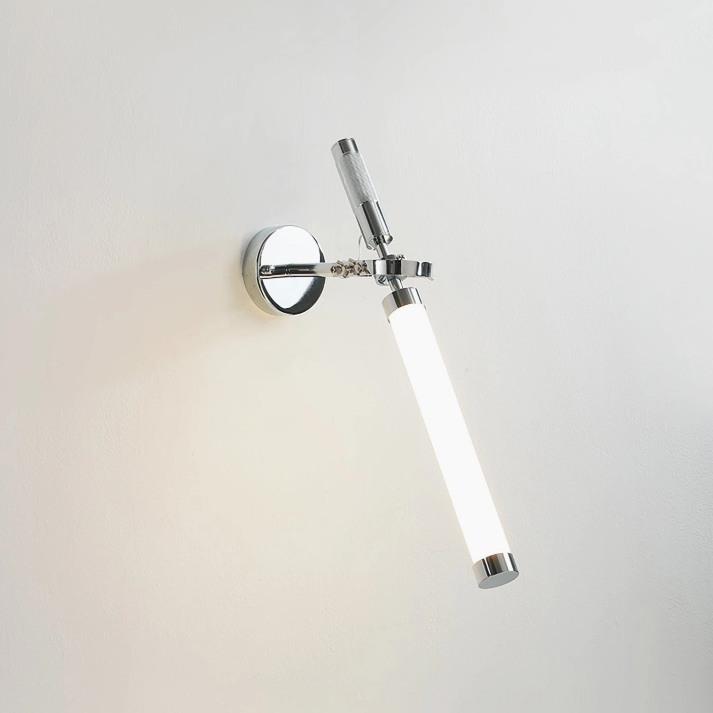 Skylark linear wall sconce frontal angled view showcasing frosted glass and chrome hardware