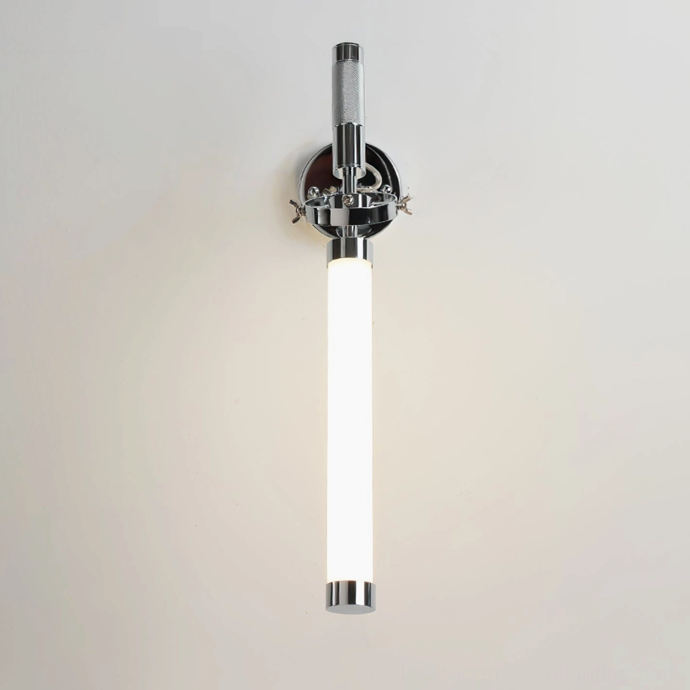 Polished chrome wall-mounted lamp with articulating arm and contemporary frosted glass shade