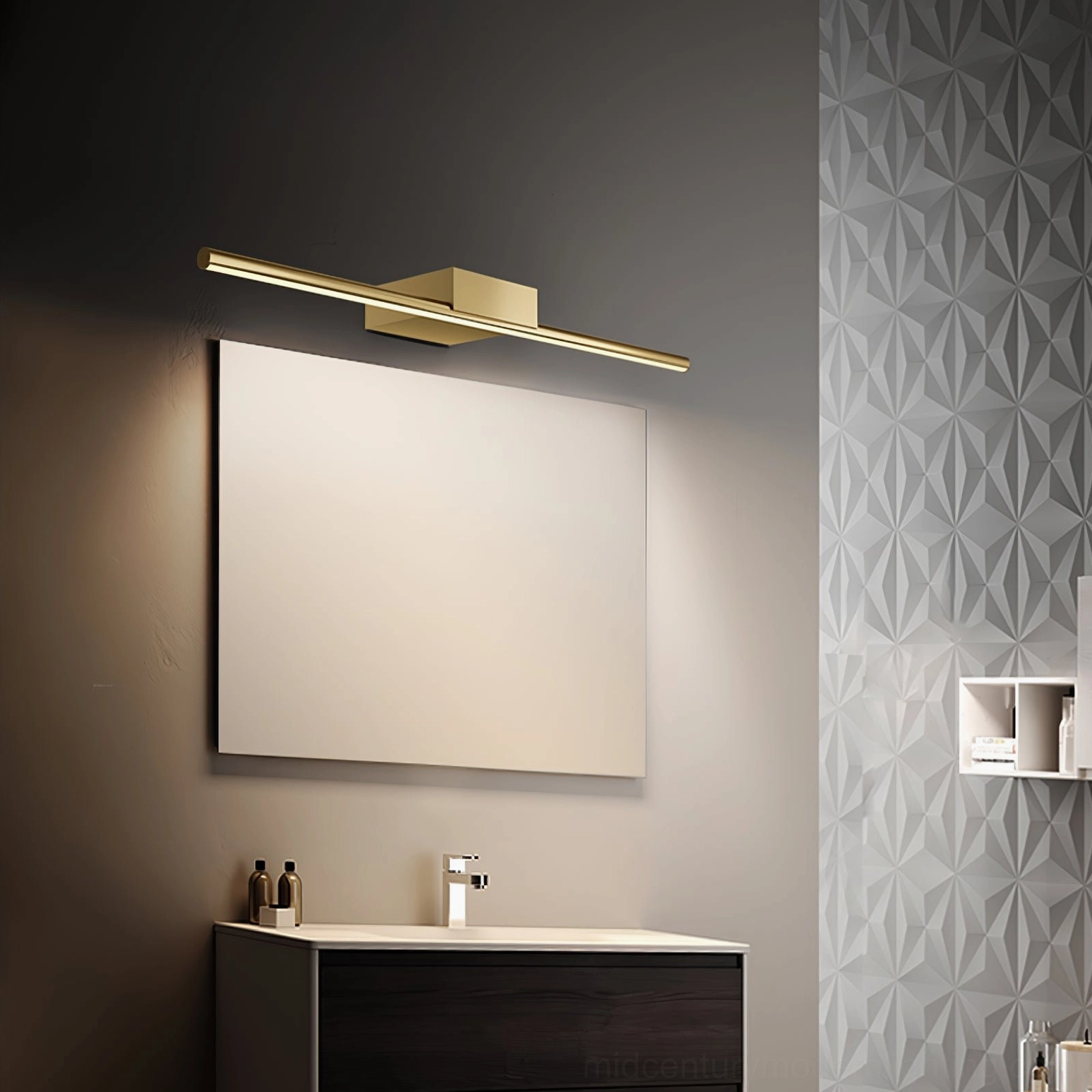 Sleek linear brass wall lamp installation on bathroom wall above sink