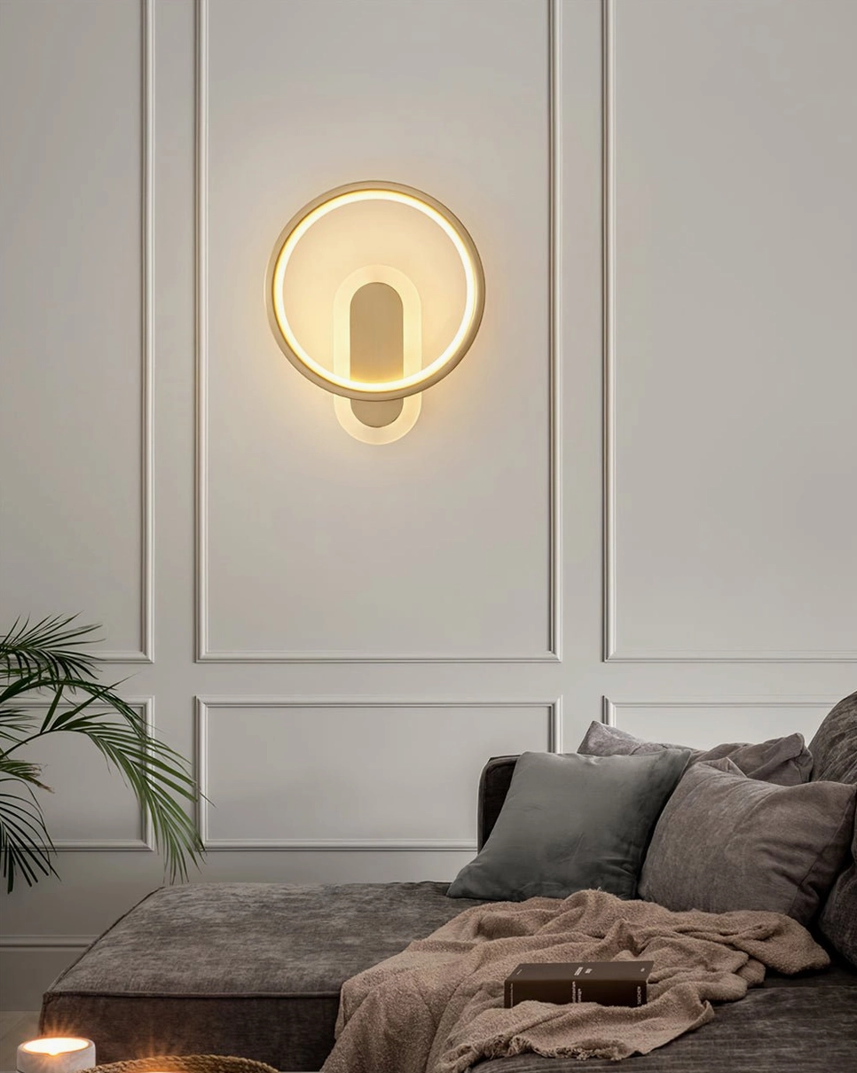 Compact minimalist wall sconce with paneled accent wall and daybed modern bedroom interior