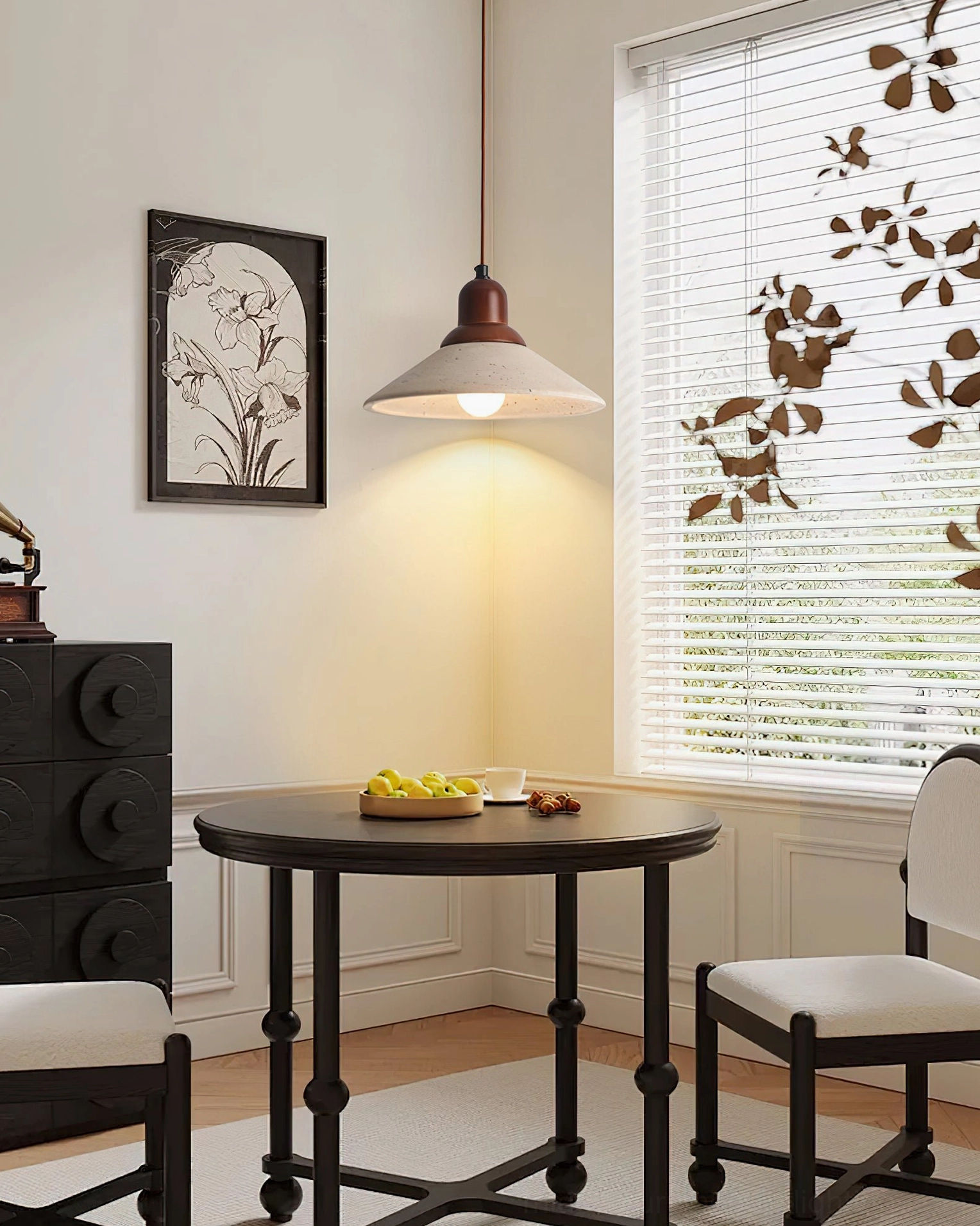 Solara pendant light in contemporary dining area with black metal furniture and window blinds