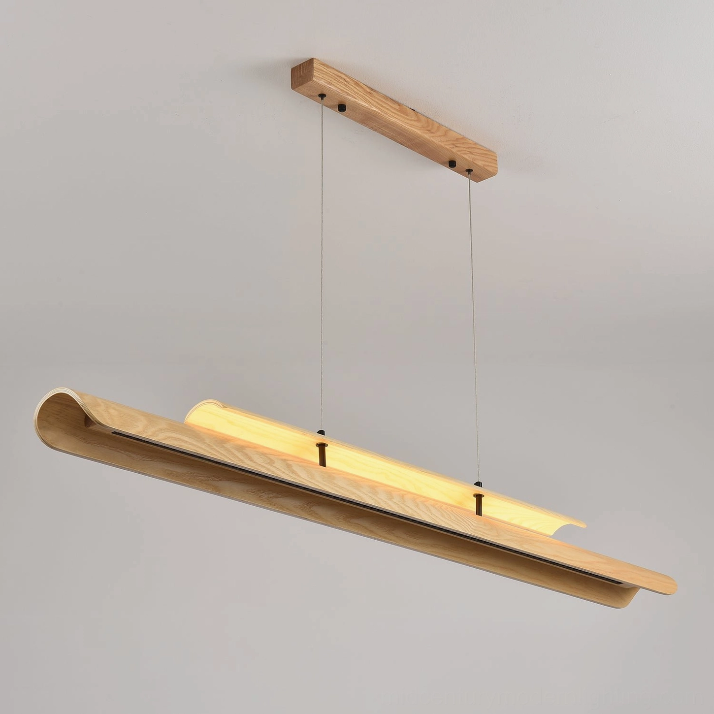 Sora wood pendant light close-up wood grain and bentwood construction