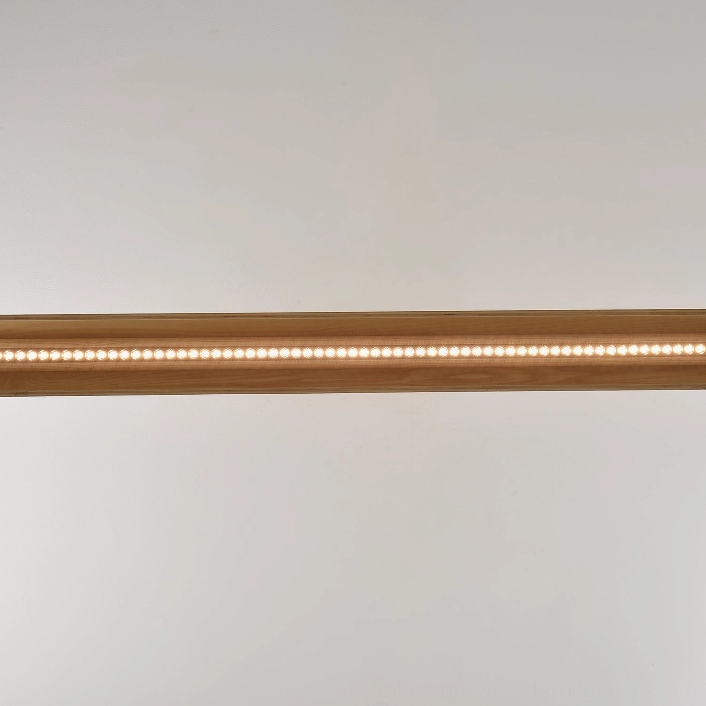 Contemporary linear wood pendant light sculptural design statement