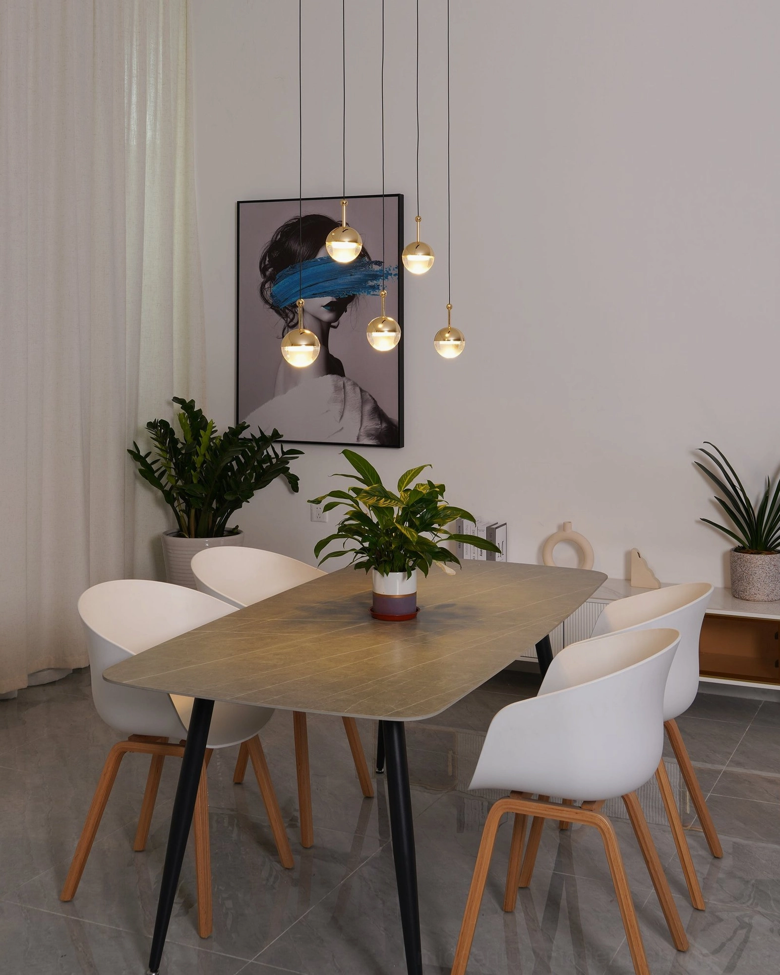 Spherical glass pendant light contemporary home interior ambient lighting setup installation example
