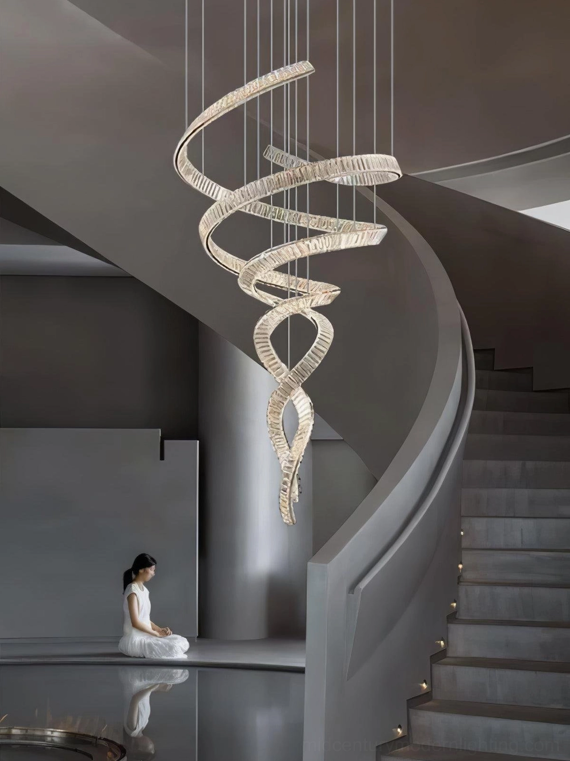 Spiral crystal chandelier contemporary installation, geometric ribbon design in modern luxury residential space