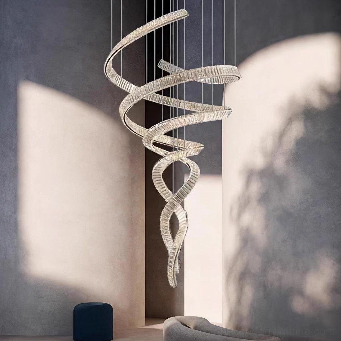 Spiral crystal staircase chandelier in double-height modern foyer, geometric twisted ribbon design with integrated LED lighting