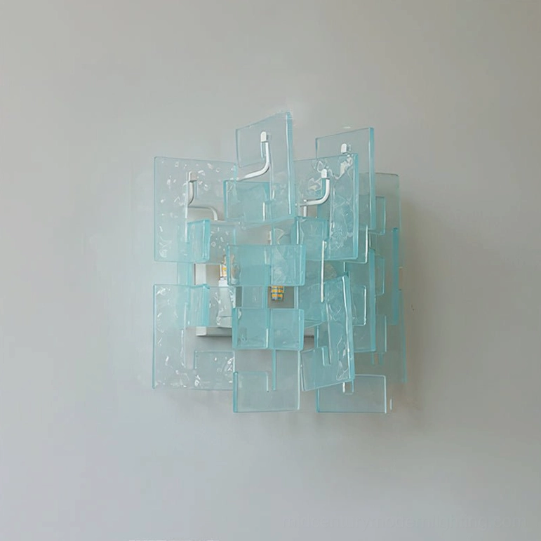 Stagger cast glass wall sconce blue aqua tint Scandinavian modern design aesthetic