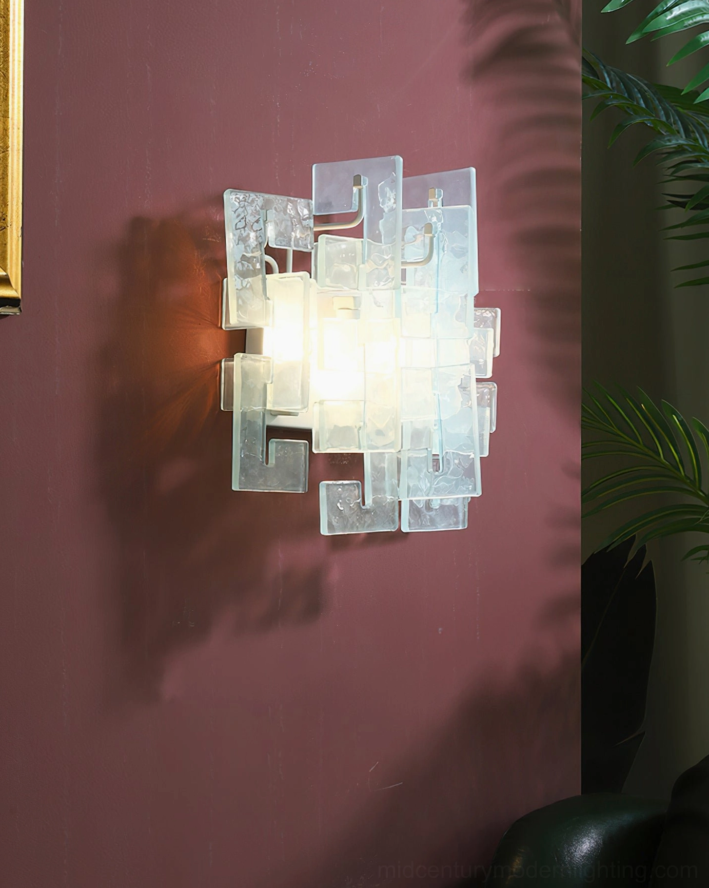 Stagger cast glass sconce gallery installation paired symmetrical wall display