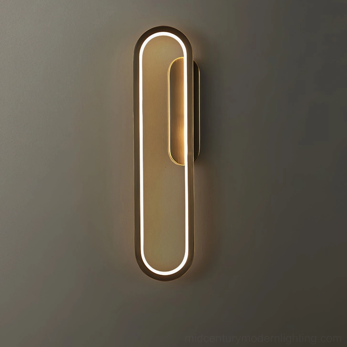 Starkey contemporary LED wall sconce in black matte finish mounted on feature wall