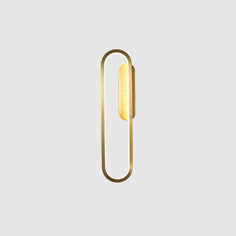 Brass finish Starkey LED wall sconce paired installation showing symmetrical minimalist design principle