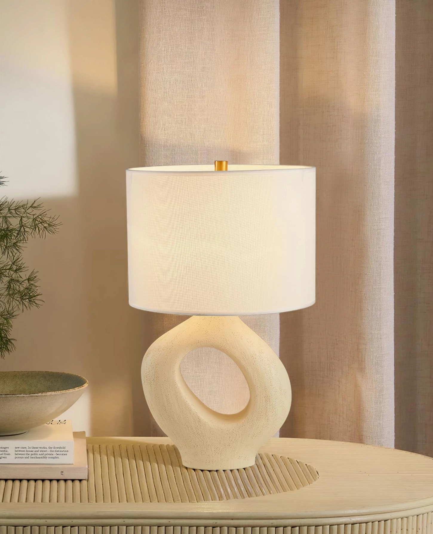 Modern sculptural table lamp with resin cutout base, gallery-worthy lighting statement piece