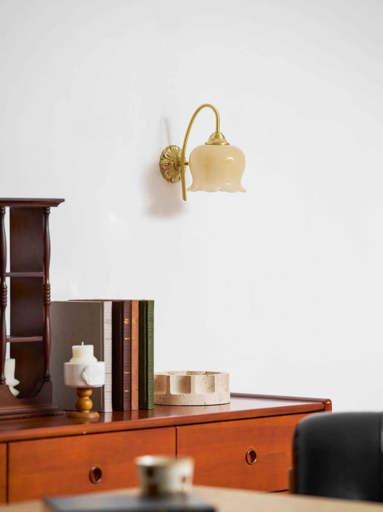 Full view lily of the valley wall lamp installed as statement piece in modern home interior