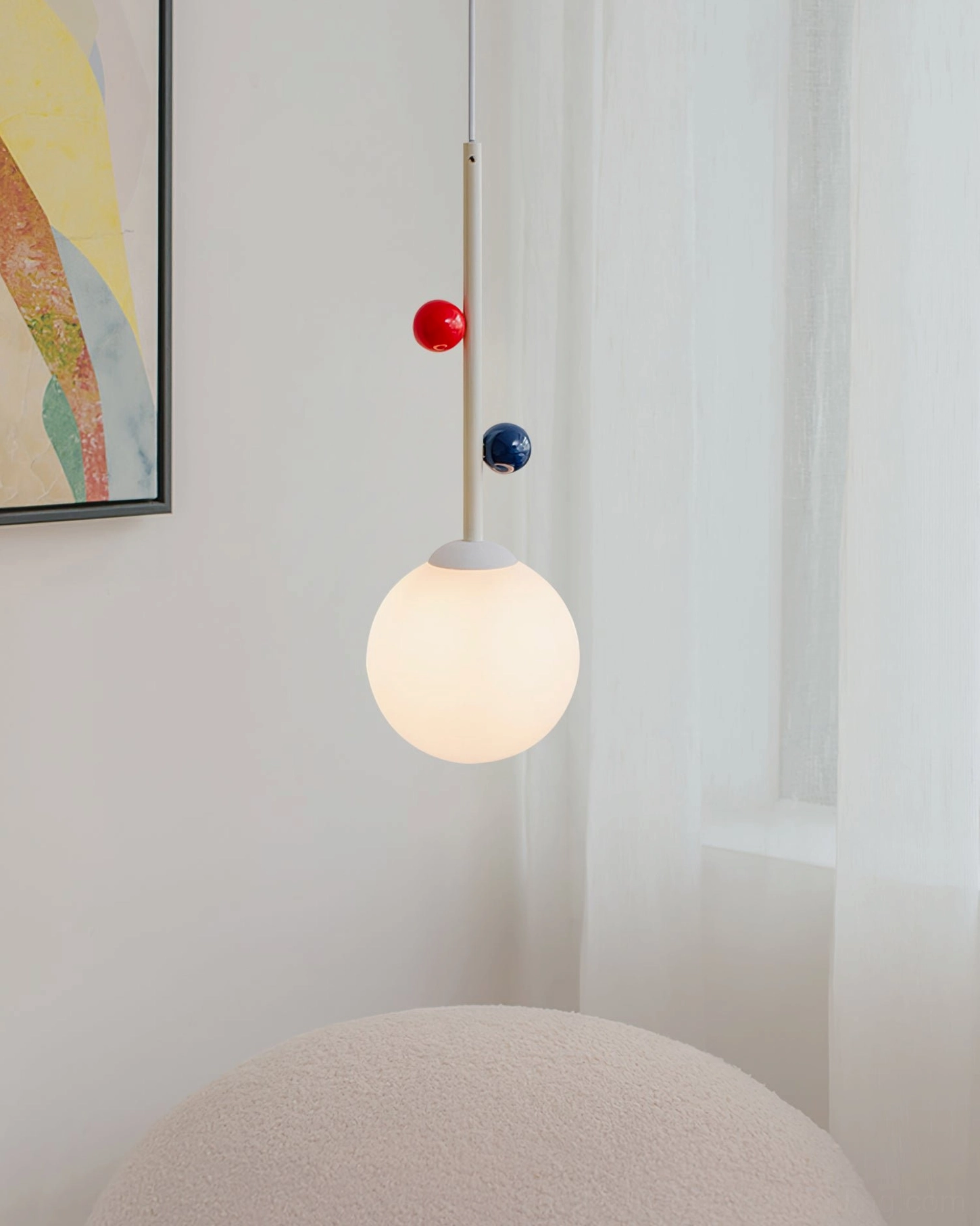 Stax pendant lamp mounted in minimal bedroom wall with abstract artwork and window, ambient lighting