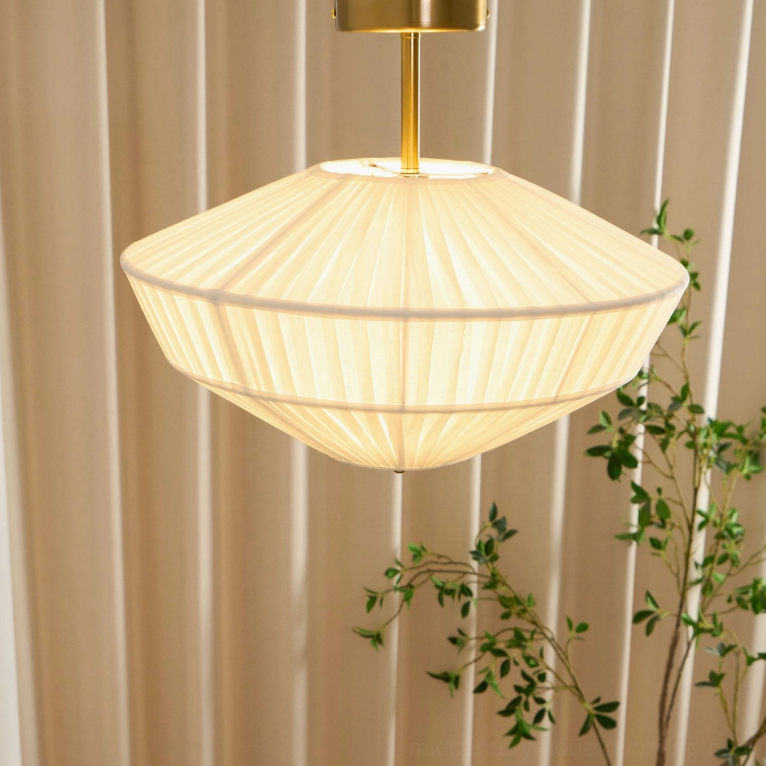 Stefanie semi-flush lamp installed on ceiling demonstrating warm light diffusion through pleated fabric shade