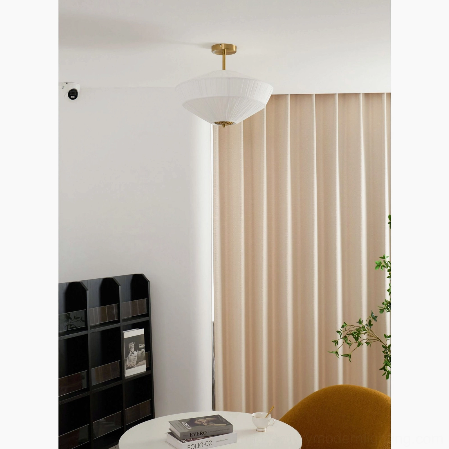 Stefanie pleated ceiling fixture in contemporary home creating ambient warm light in living space