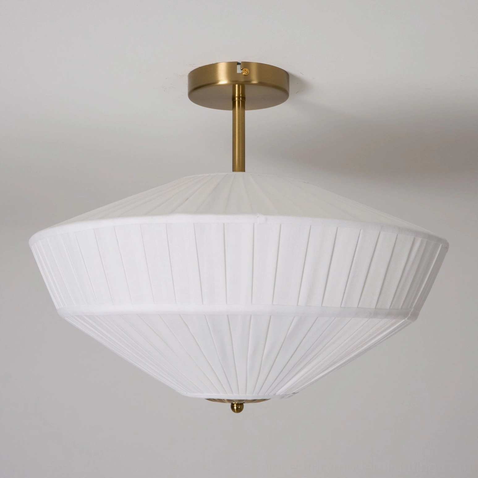 Stefanie pleated ceiling semi-flush lamp installed in modern interior with minimalist aesthetic