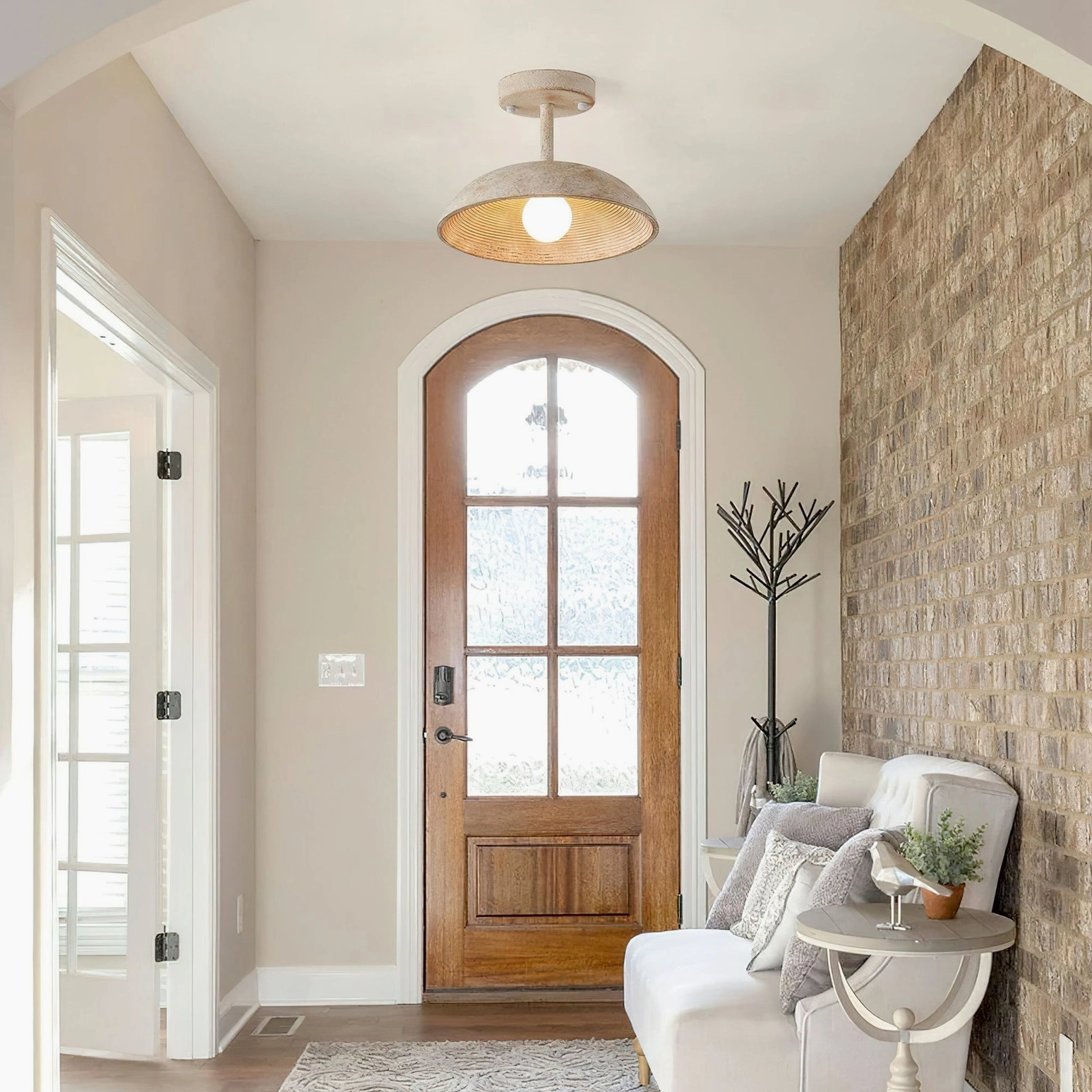 Stevie ceiling light installed in modern farmhouse entryway, demonstrating real-world application and ambient warm glow