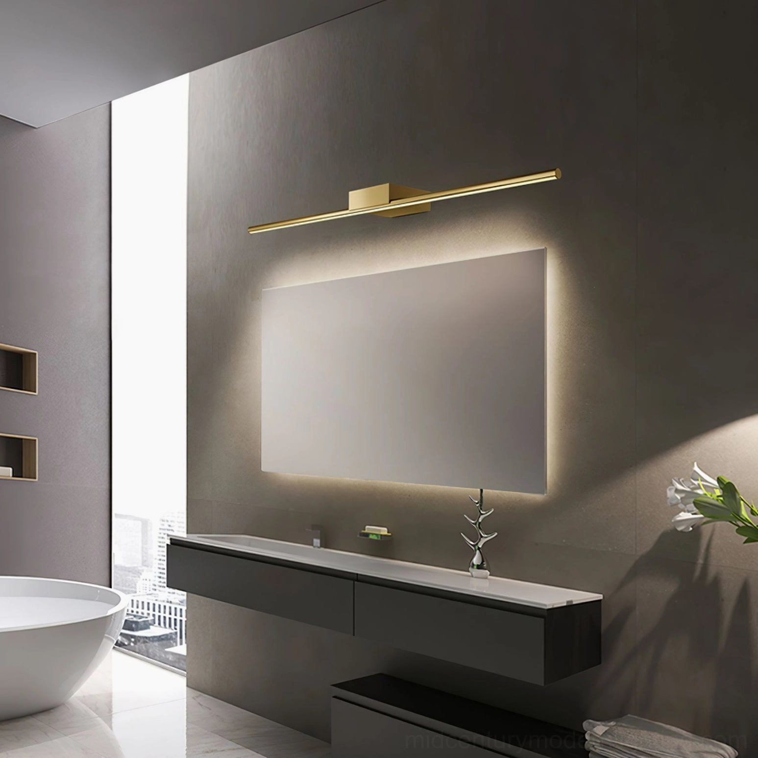 Luxury modern bathroom with streamlined brass wall light and freestanding tub