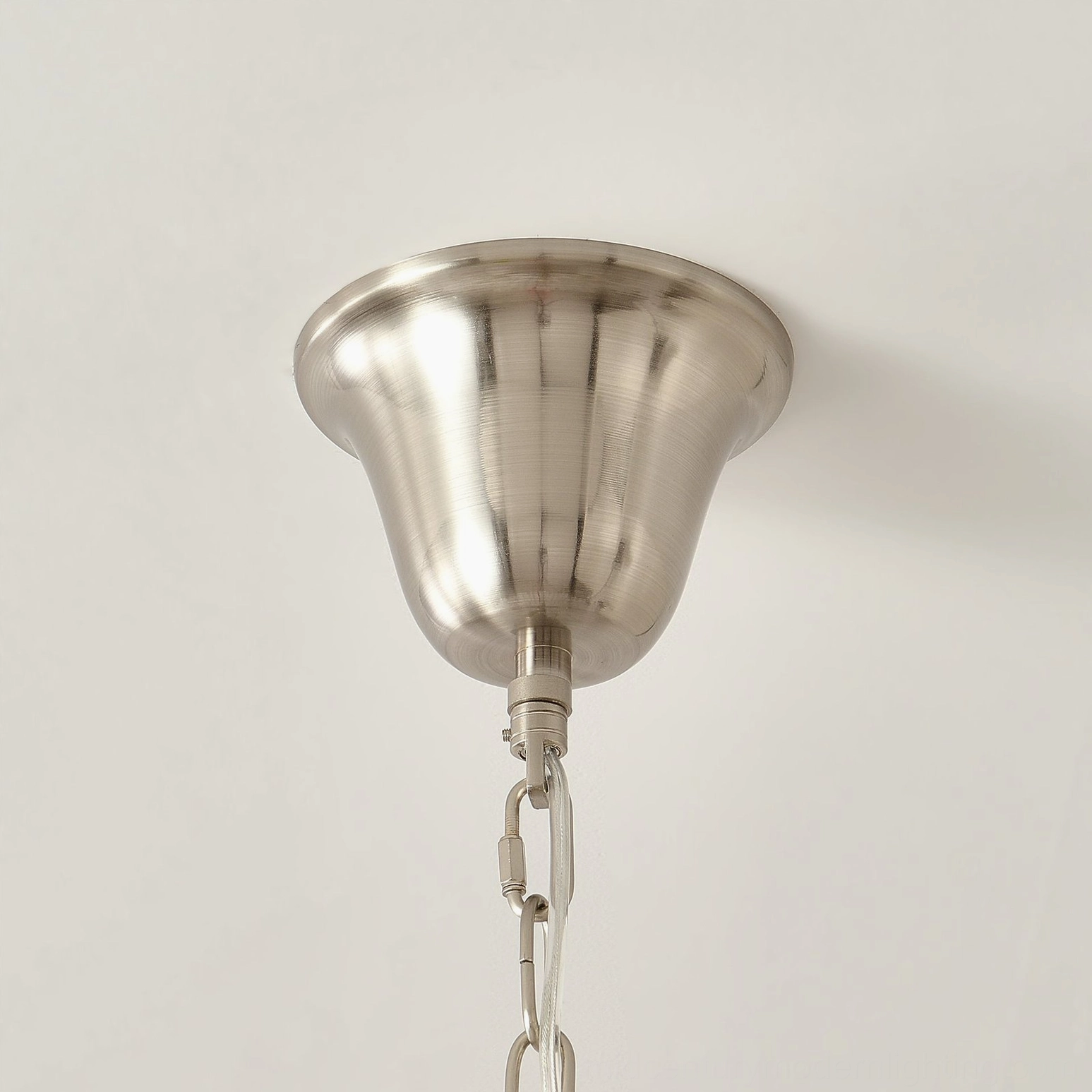 Full-length studio photograph of pink Murano tube chandelier against neutral background