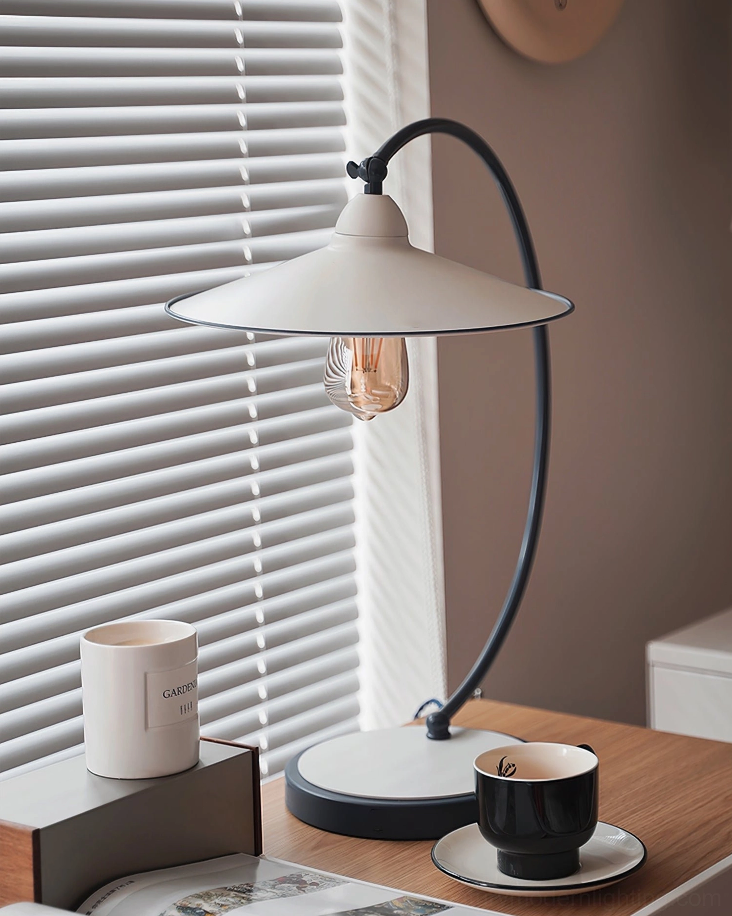 Swan Blue Table Lamp ambient lighting effect - warm glow in evening interior setting with mood lighting