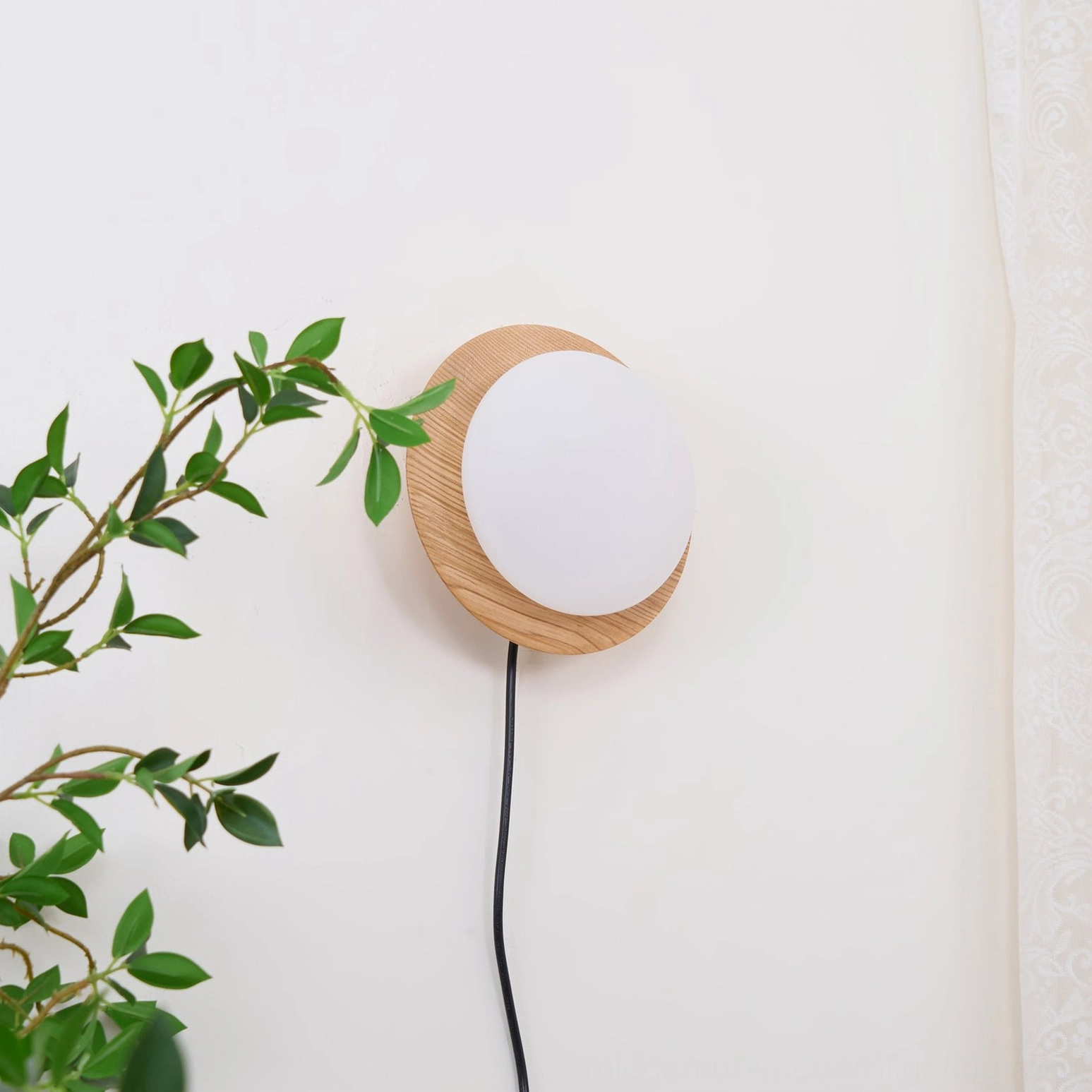Tablet wooden wall lamp fixture showing clean lines, natural materials, and mid-century modern aesthetic