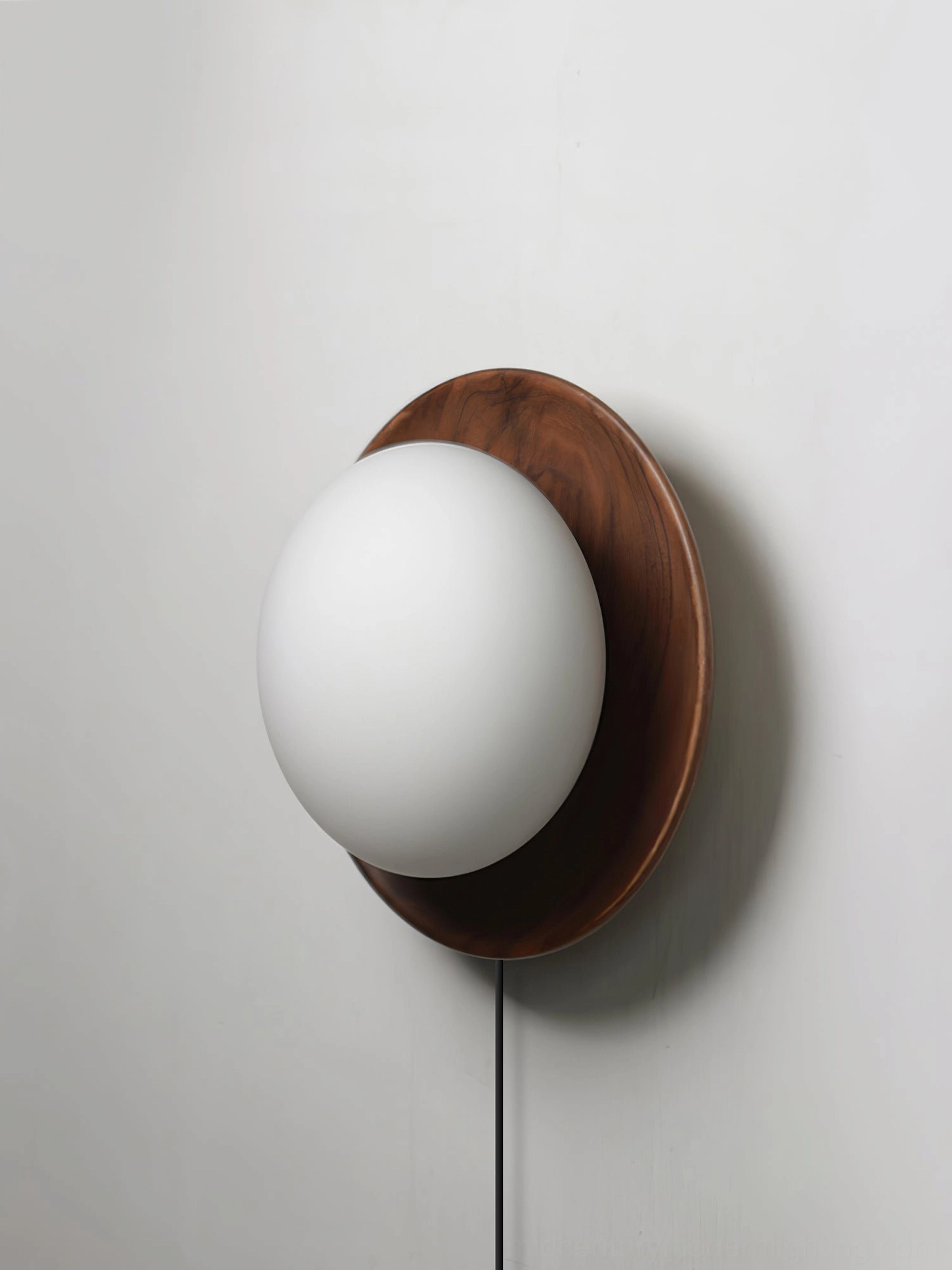 Tablet wall lamp with natural wood material and frosted diffuser glowing with integrated LED light source