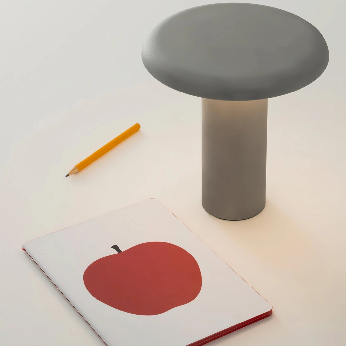 Takku cordless rechargeable mushroom table lamp styled in contemporary minimalist bedroom interior