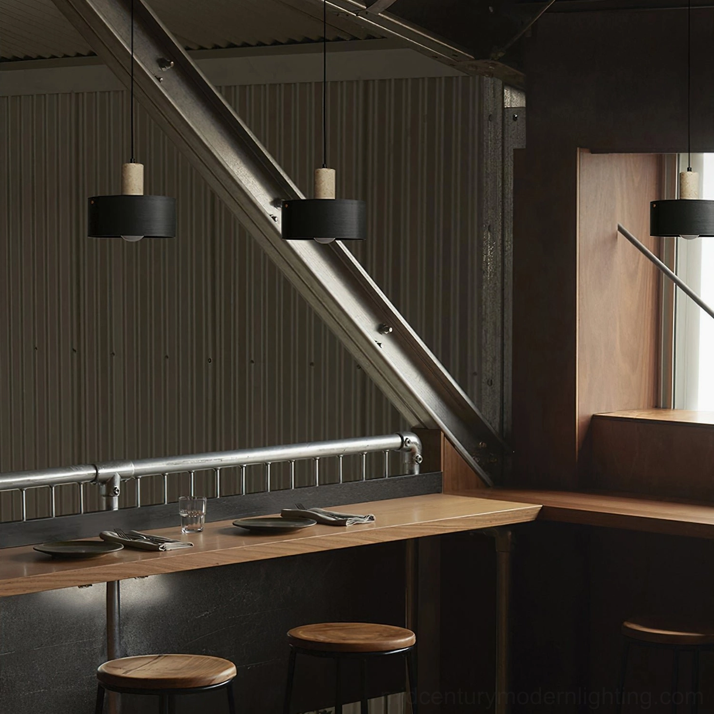 Tako wood pendant lamp close-up showing material texture and travertine stone detail
