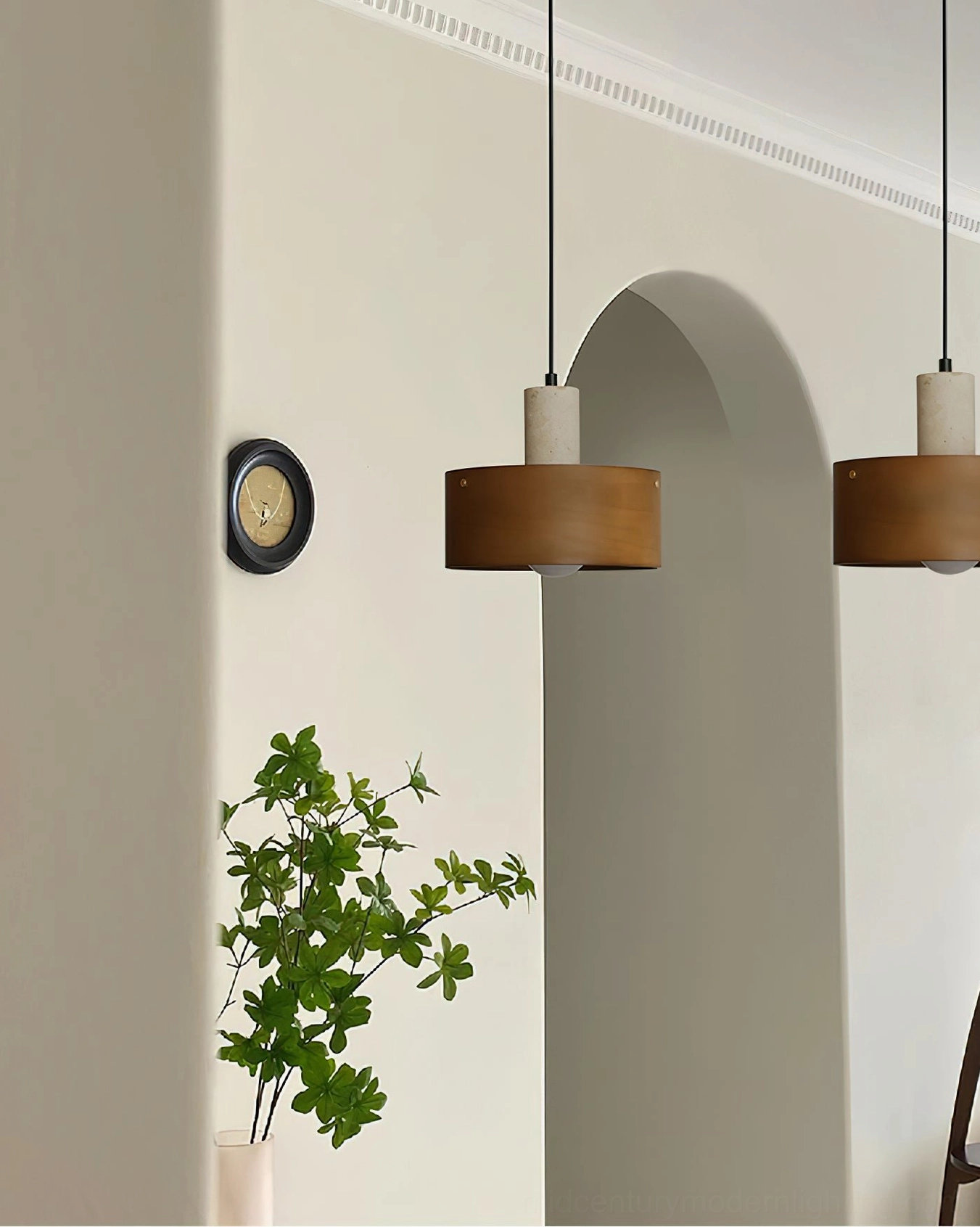 Tako travertine pendant lamp detail showing textured stone cylinder and wood shade construction