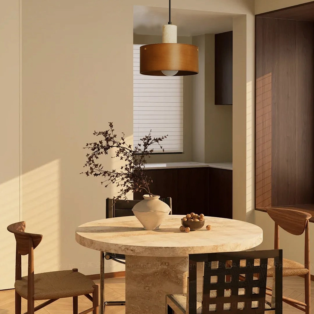 Natural wood finish Tako pendant lamp side view above stone dining table minimalist interior