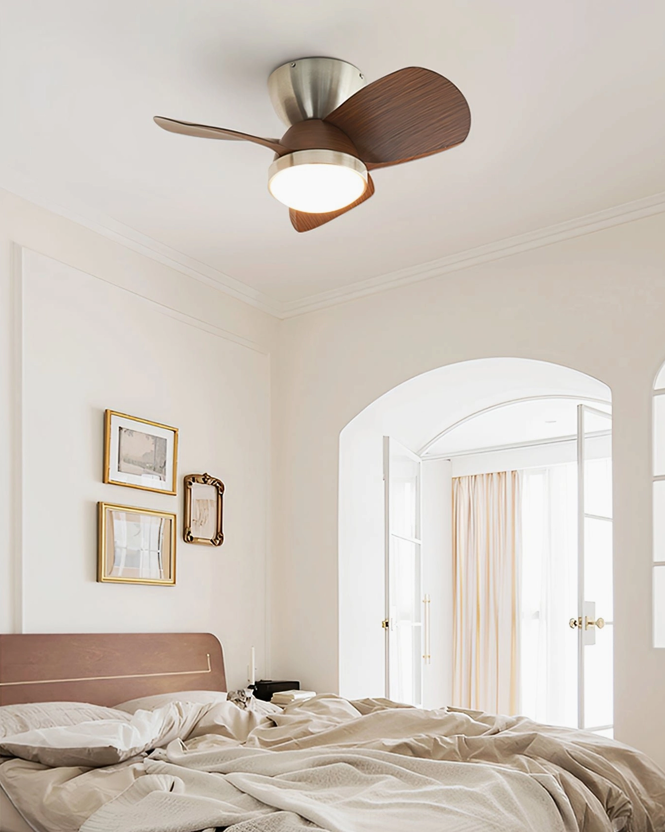 Talaya ceiling fan with LED light mounted in master bedroom with arched doorway and rustic modern décor