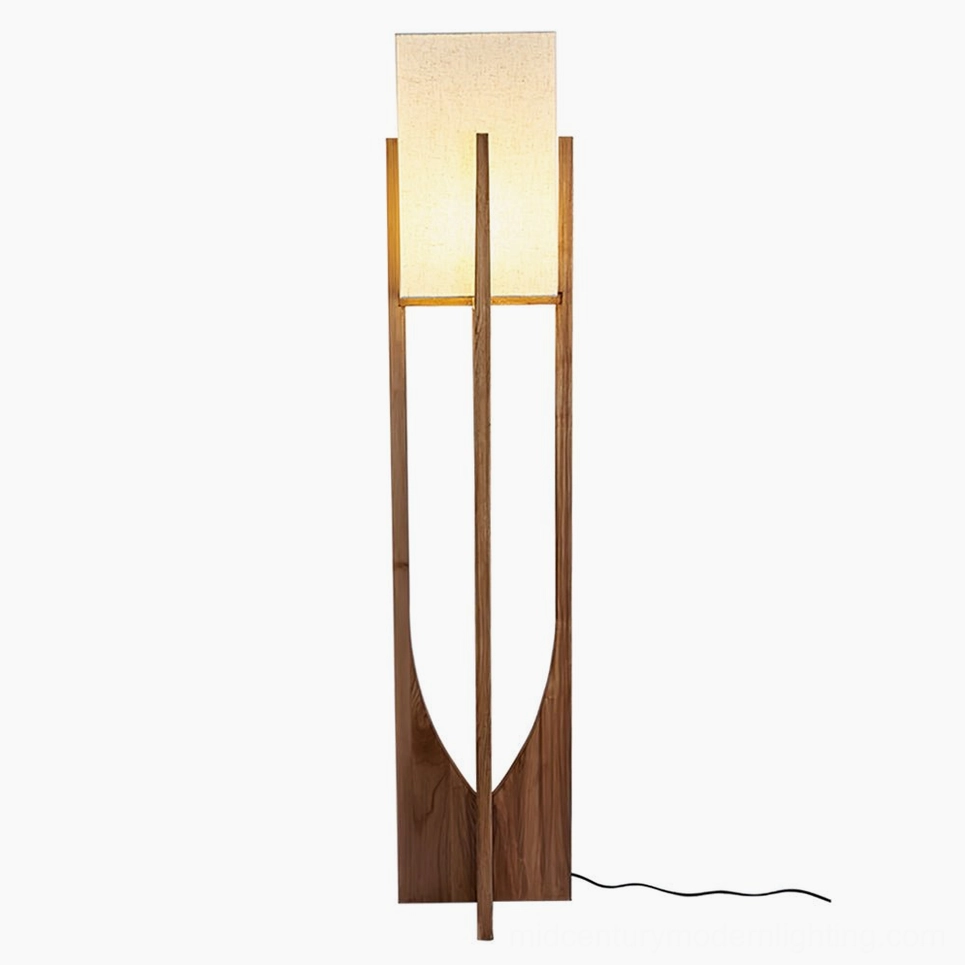 Statement size Fairbanks floor lamp in walnut finish creating focal point in modern living room