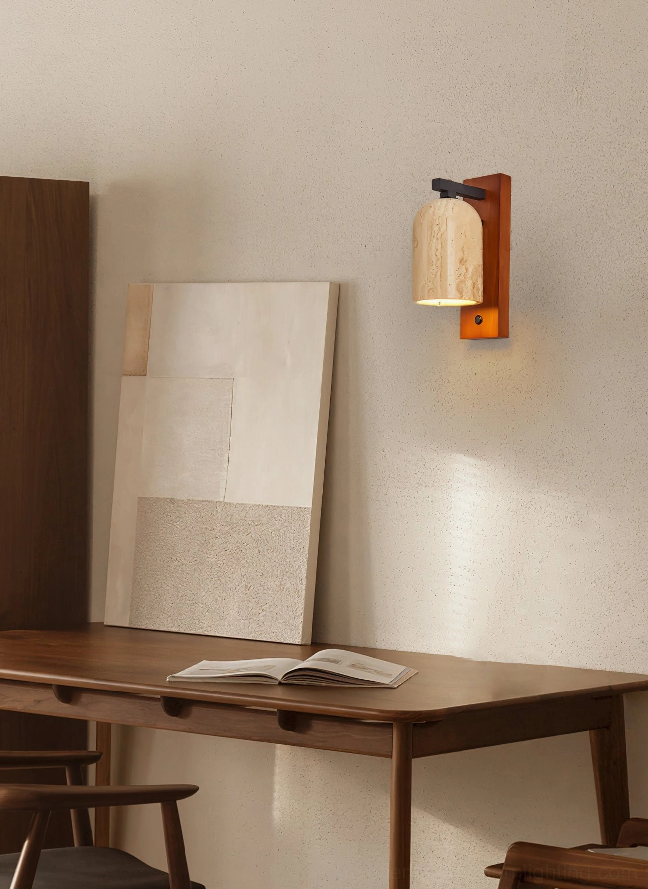 Tersus wall sconce in home office providing task lighting over wooden desk