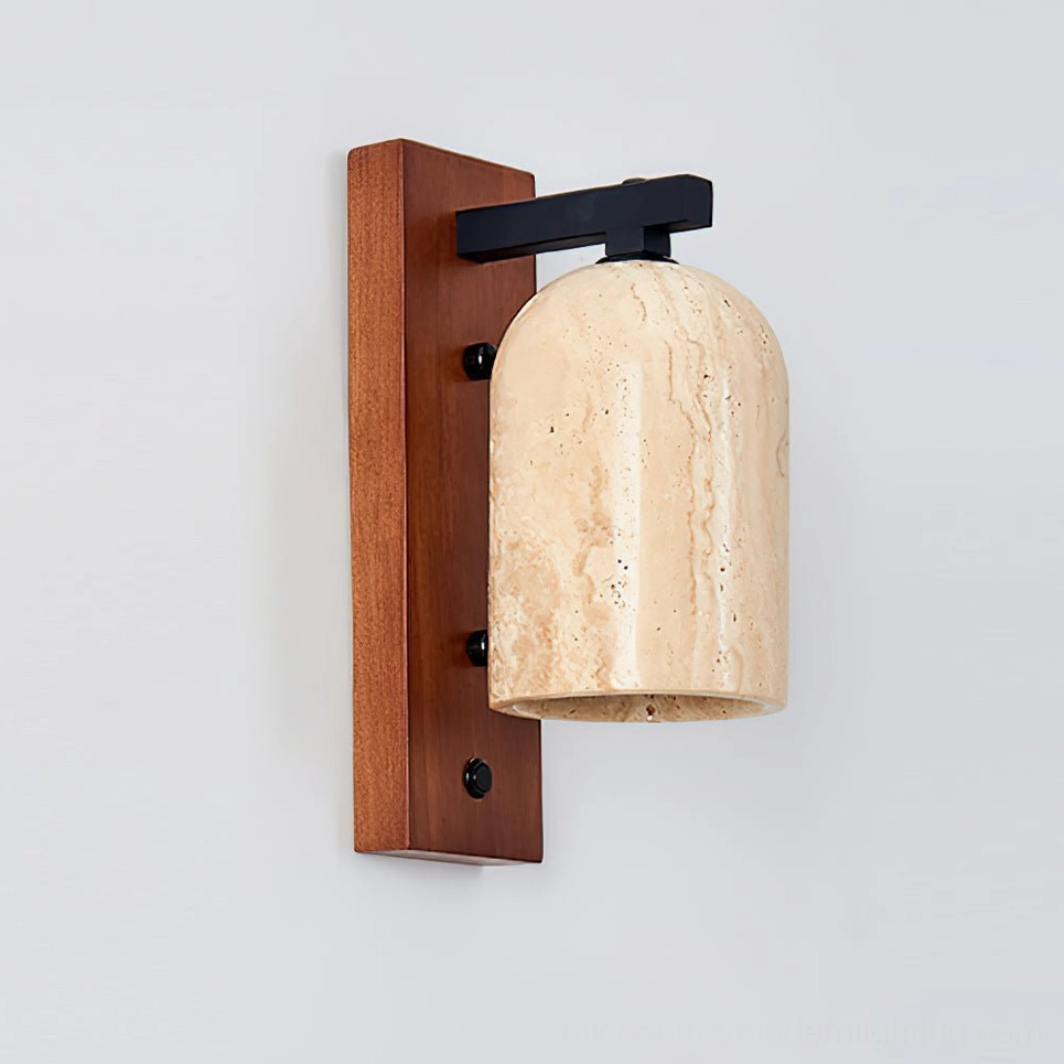Tersus travertine stone wall light showing porous surface detail and dark metal accents