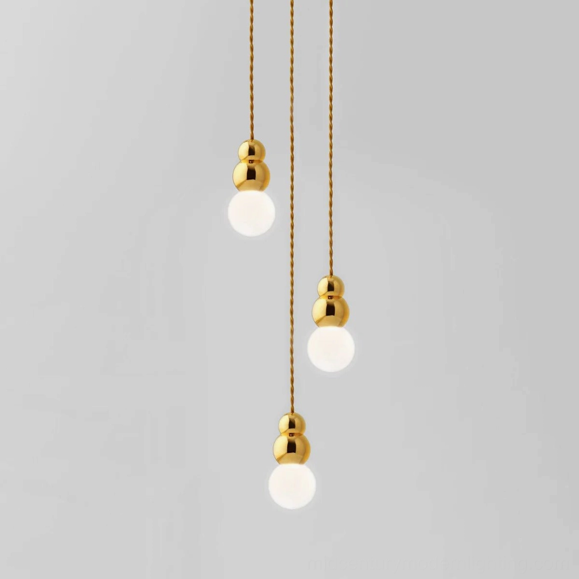 Three-head ball pendant light gold finish, polished metal sculptural pendant for luxury spaces