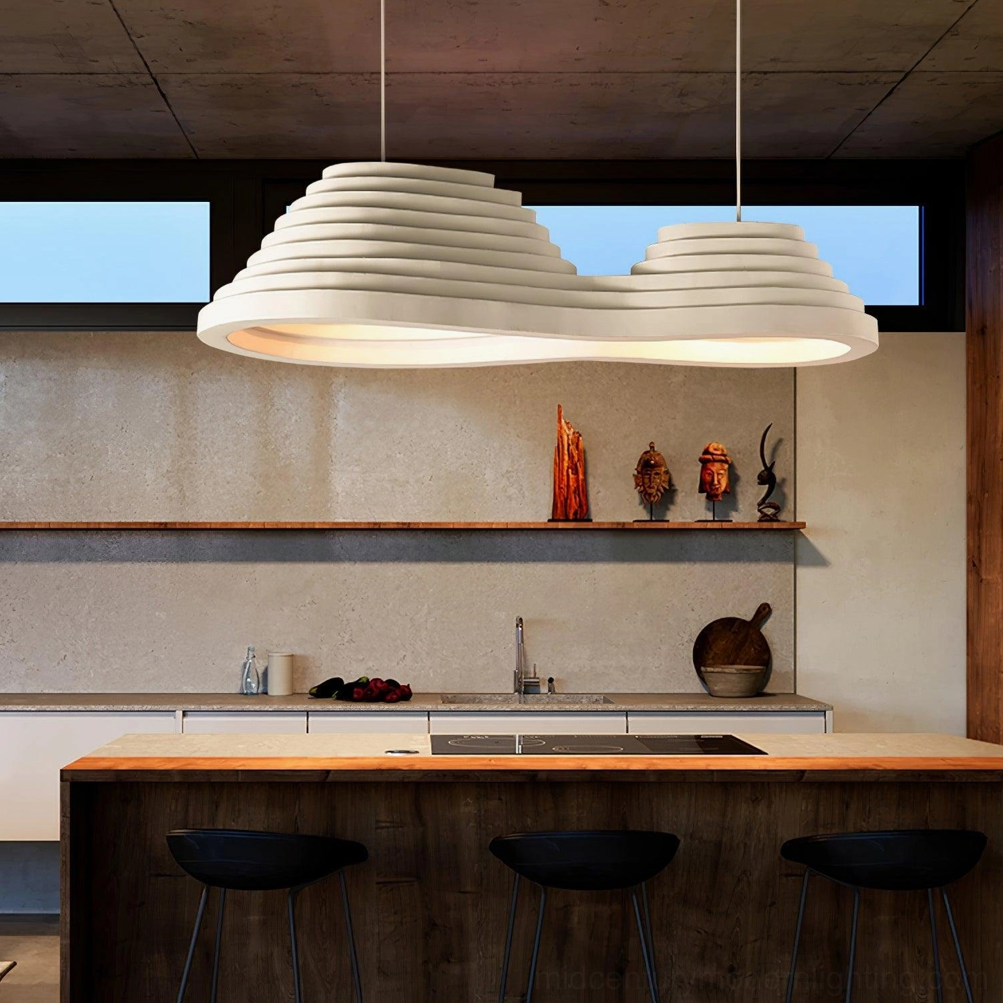 Organic tiered pendant lamp illuminating modern kitchen with island seating and warm rustic ambiance