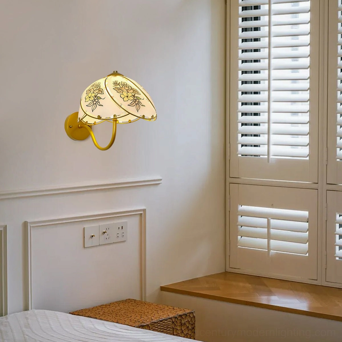 Tiffany Lily Wall Sconce in bedroom setting with louvered window seat creating soft ambient glow
