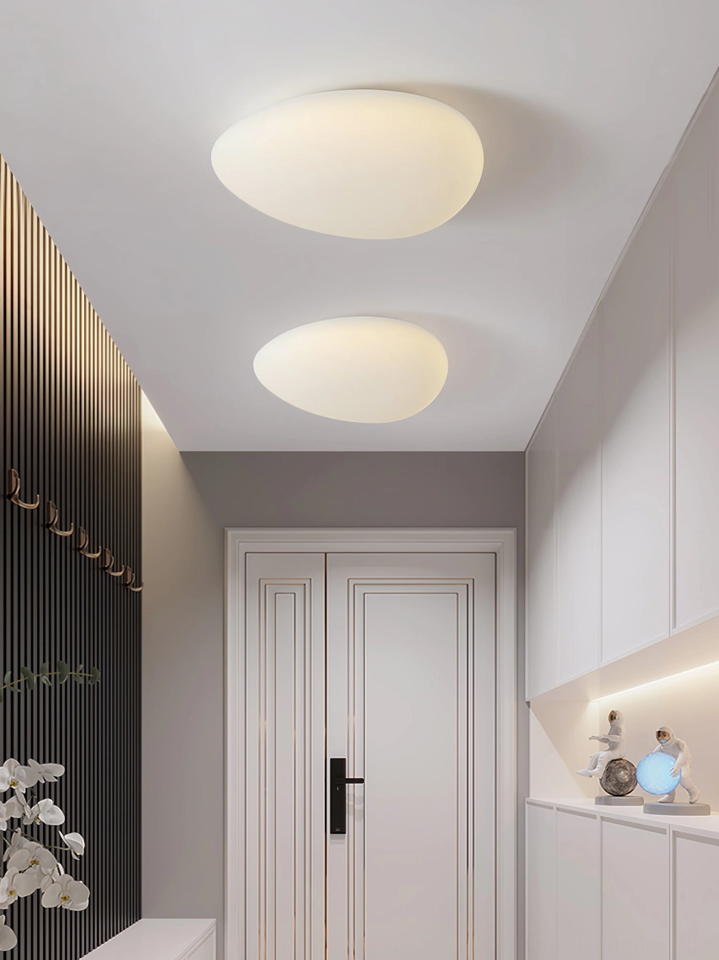 Two Toan LED ceiling lights installed symmetrically in modern foyer, dual fixtures creating balanced illumination
