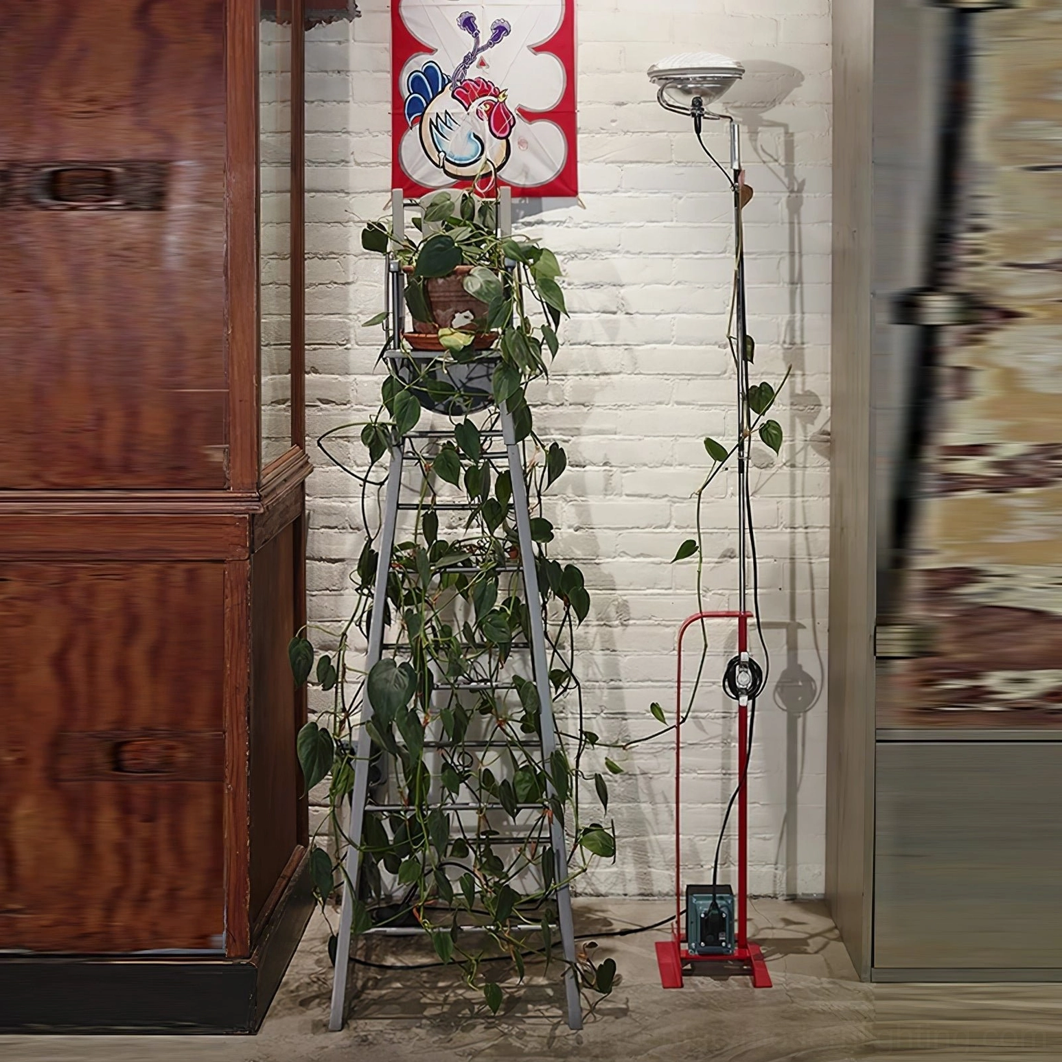 Toio floor lamp side profile tall slender metal construction