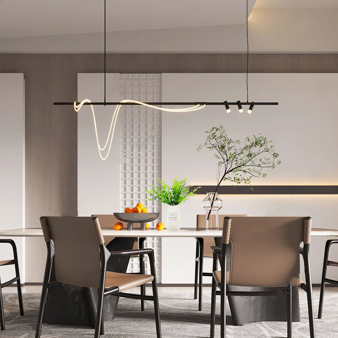 Contemporary pendant chandelier with multiple spotlights and flowing neon light in warm modern dining space with plants