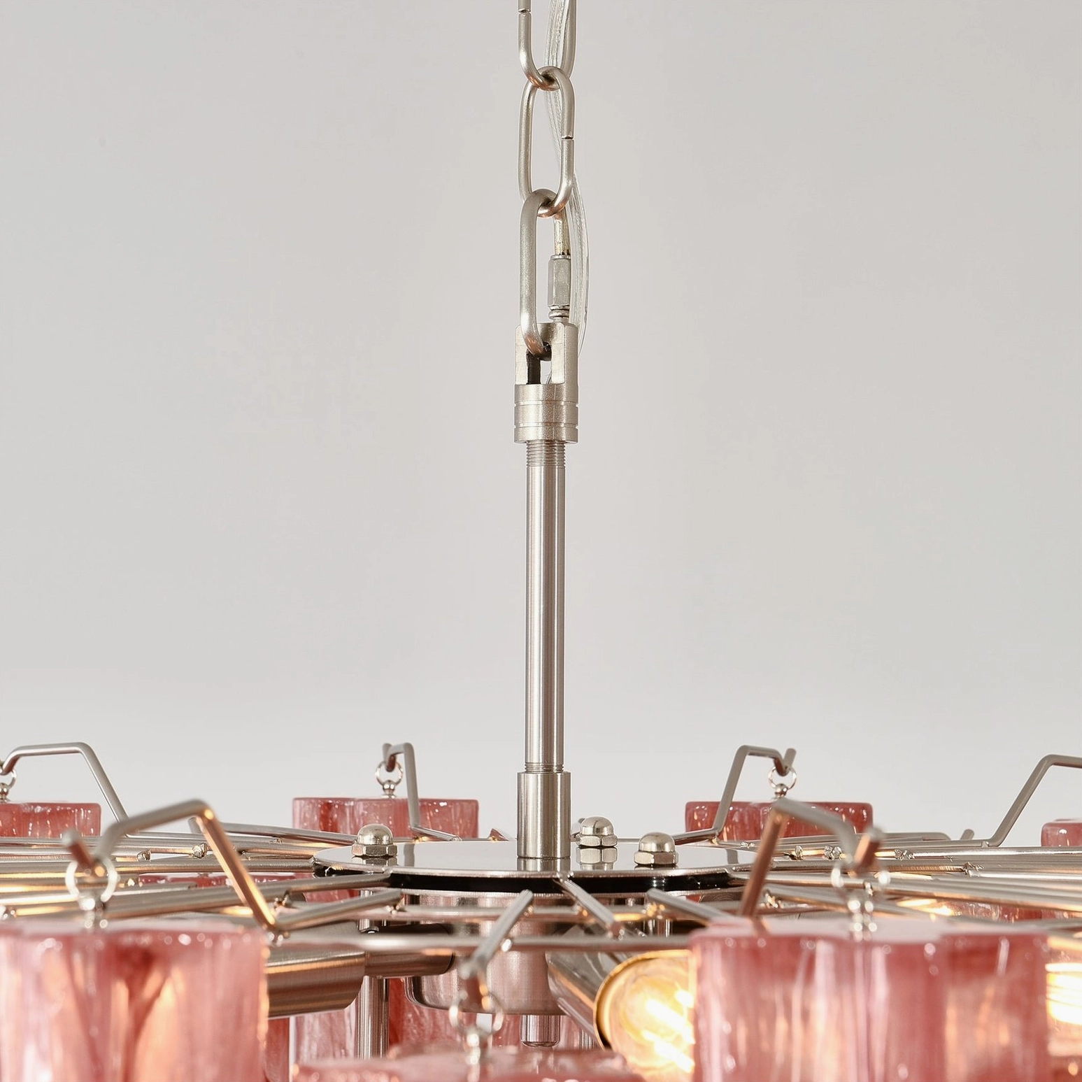 Pink Murano tube chandelier in transitional interior setting showing style versatility and design compatibility