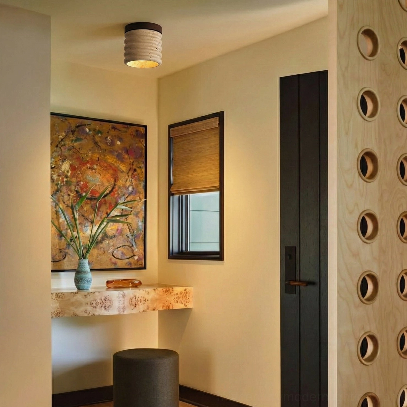 Installed travertine ceiling lamp in residential entryway vanity nook, warm earthy ambiance